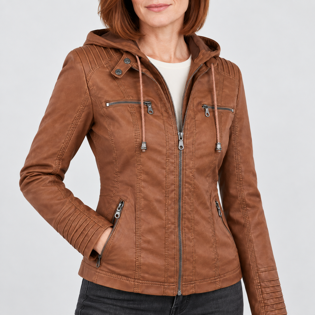 Close-up of hooded moto jacket with zipped pockets, showing collar, zipper and stitched panel details