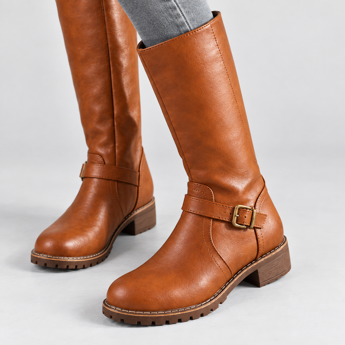 Knee-High Boots with Ankle Buckle in brown - detail view on model