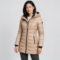 Beige hooded quilted puffer coat with zip pockets worn by a model against a light grey studio background