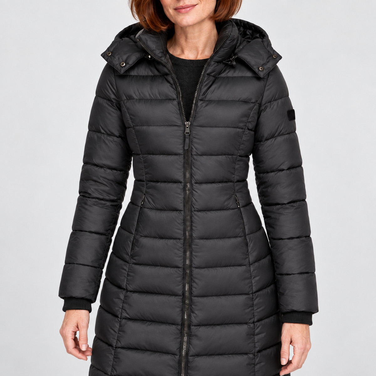 Longline Quilted Hooded Coat in black - detail view on model