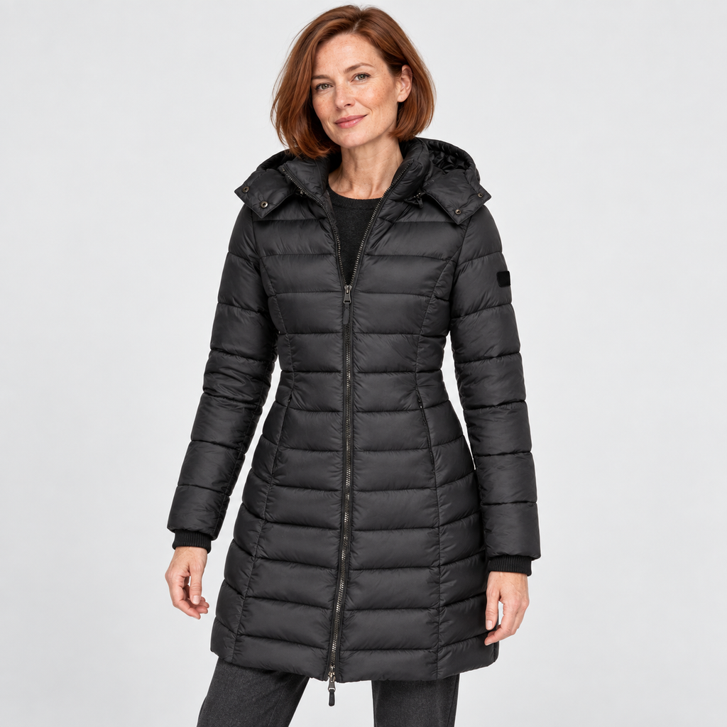 Longline Quilted Hooded Coat in black - front three-quarter view on model