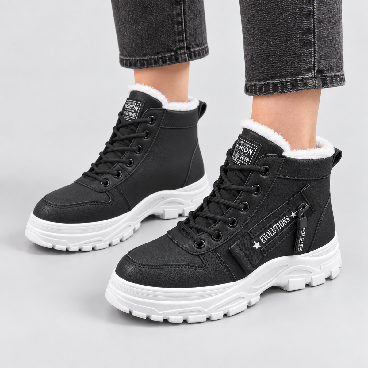 Fleece-Lined Lace-Up Ankle Boots in black - front three-quarter view on model