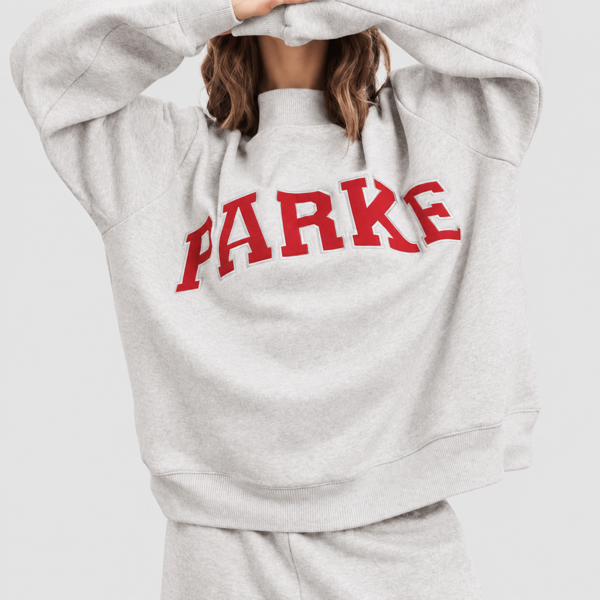 Marguerite | Women’s Oversized Mock-Neck Varsity Sweatshirt — Light grey-red letter