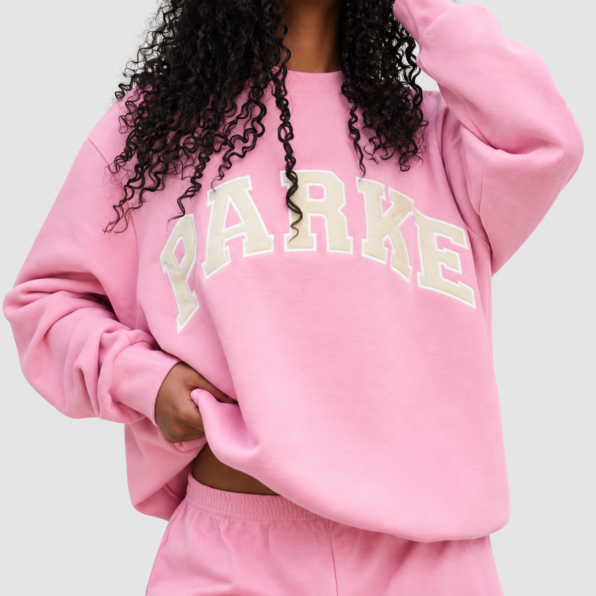 Marguerite | Women’s Oversized Mock-Neck Varsity Sweatshirt — Pink-yellow letters