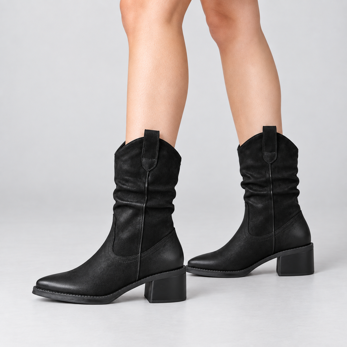 Western Slouch Boots with Side Zip in black - front view on model